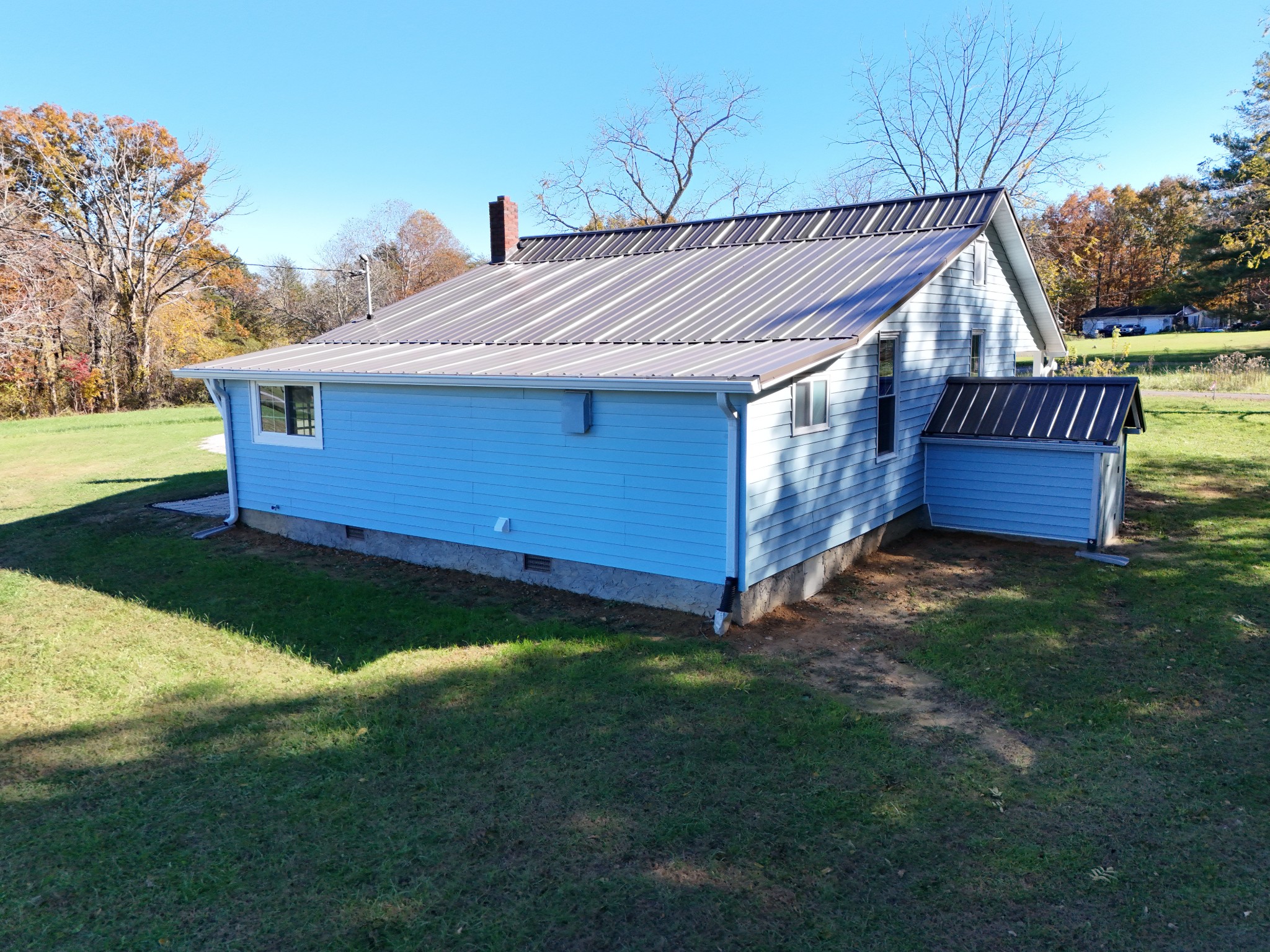 65 Duck Pond Road Palmer, TN 37365 - Photo 22 of 25 a view of backyard with deck and garden
