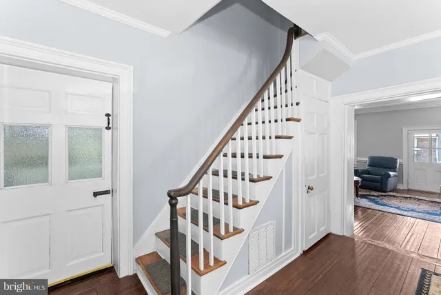 a bedroom with a bed and a fireplace