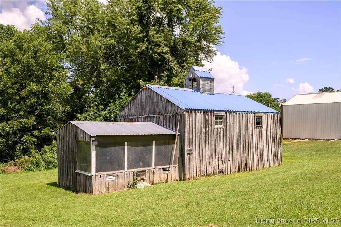 4100 Brush College Road Floyds Knobs, IN 47119 - Photo 61 of 66 Older wood barn with blue tin roof