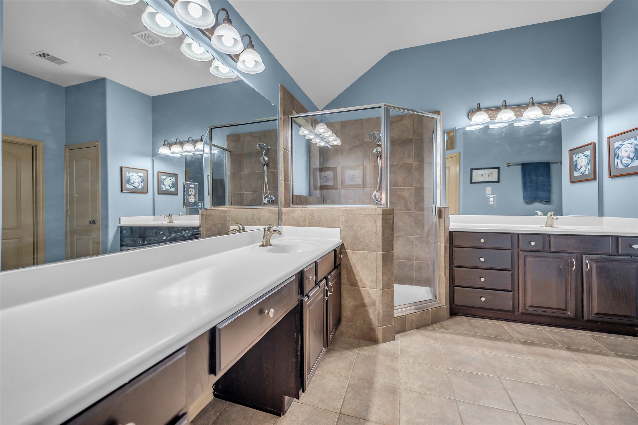 12006 Bayou Junction Road Cypress, TX 77433 - Photo 20 of 38 Primary bath complete with two LARGE vanities, massive walk in closet that connects to laundry area, large shower and lots of storage
