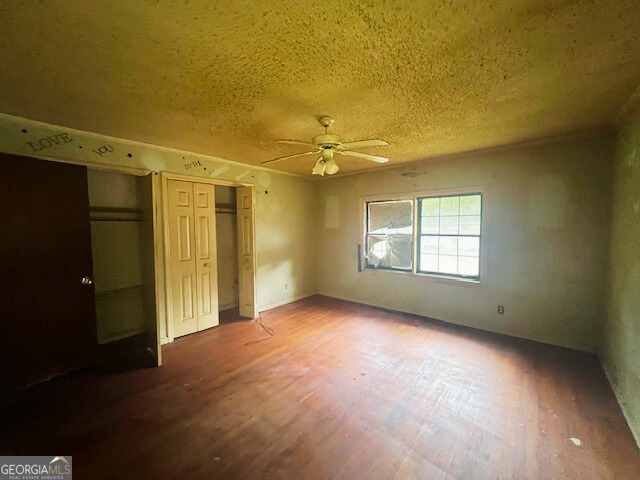 2445 Irwinton Road Milledgeville, GA 31061 - Photo 16 of 25 an empty room with windows and closet