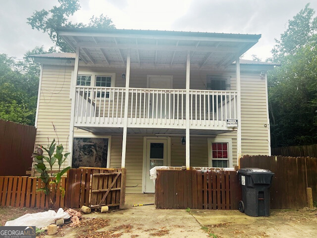 2445 Irwinton Road Milledgeville, GA 31061 - Photo 18 of 25 a front view of house with outdoor seating