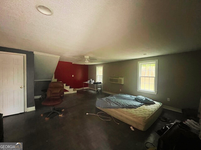 2445 Irwinton Road Milledgeville, GA 31061 - Photo 19 of 25 a living room with furniture rug and lamp