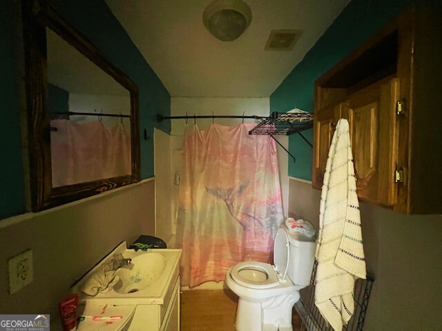 2445 Irwinton Road Milledgeville, GA 31061 - Photo 22 of 25 a bathroom with a sink toilet and shower