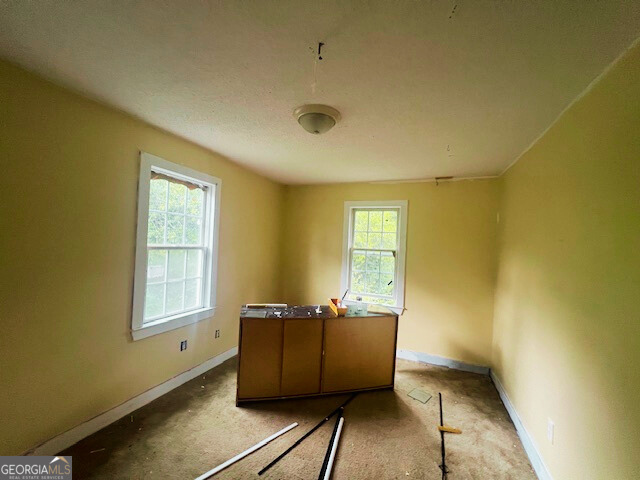 2445 Irwinton Road Milledgeville, GA 31061 - Photo 23 of 25 a view of a room with window and wooden floor