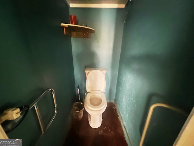 2445 Irwinton Road Milledgeville, GA 31061 - Photo 25 of 25 a bathroom with a toilet and a sink