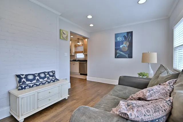 a living room with furniture and a couch