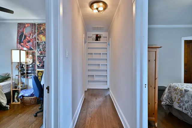 a view of a bedroom from a hallway