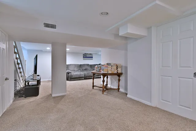 a living room with furniture and a couch