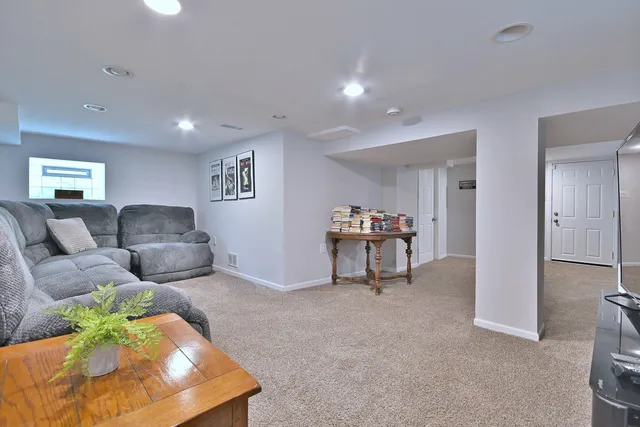 a living room with furniture and a couch