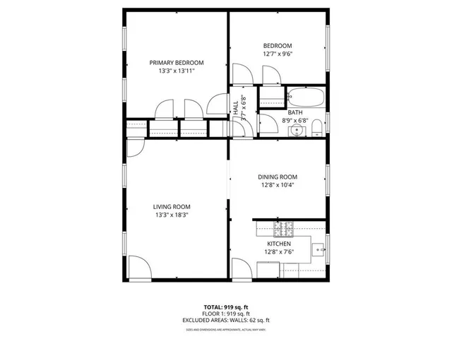 a picture of a building with a white fence