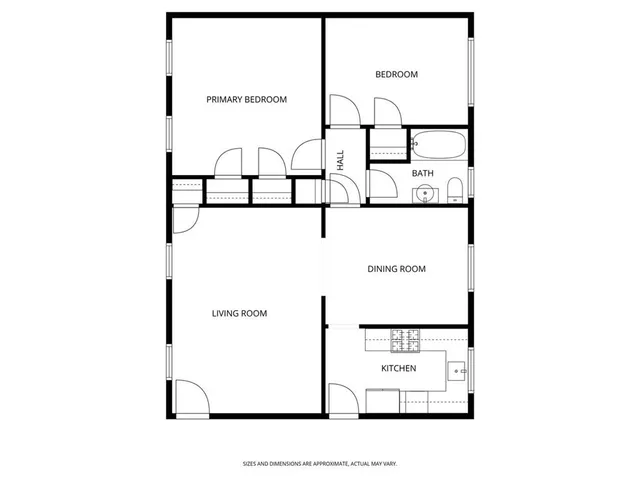 a picture of a bench in front of a wall