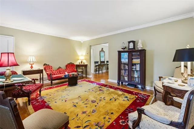 a bed room with a bed and a chair