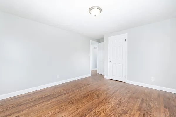 a bathroom with a bathtub and toilet