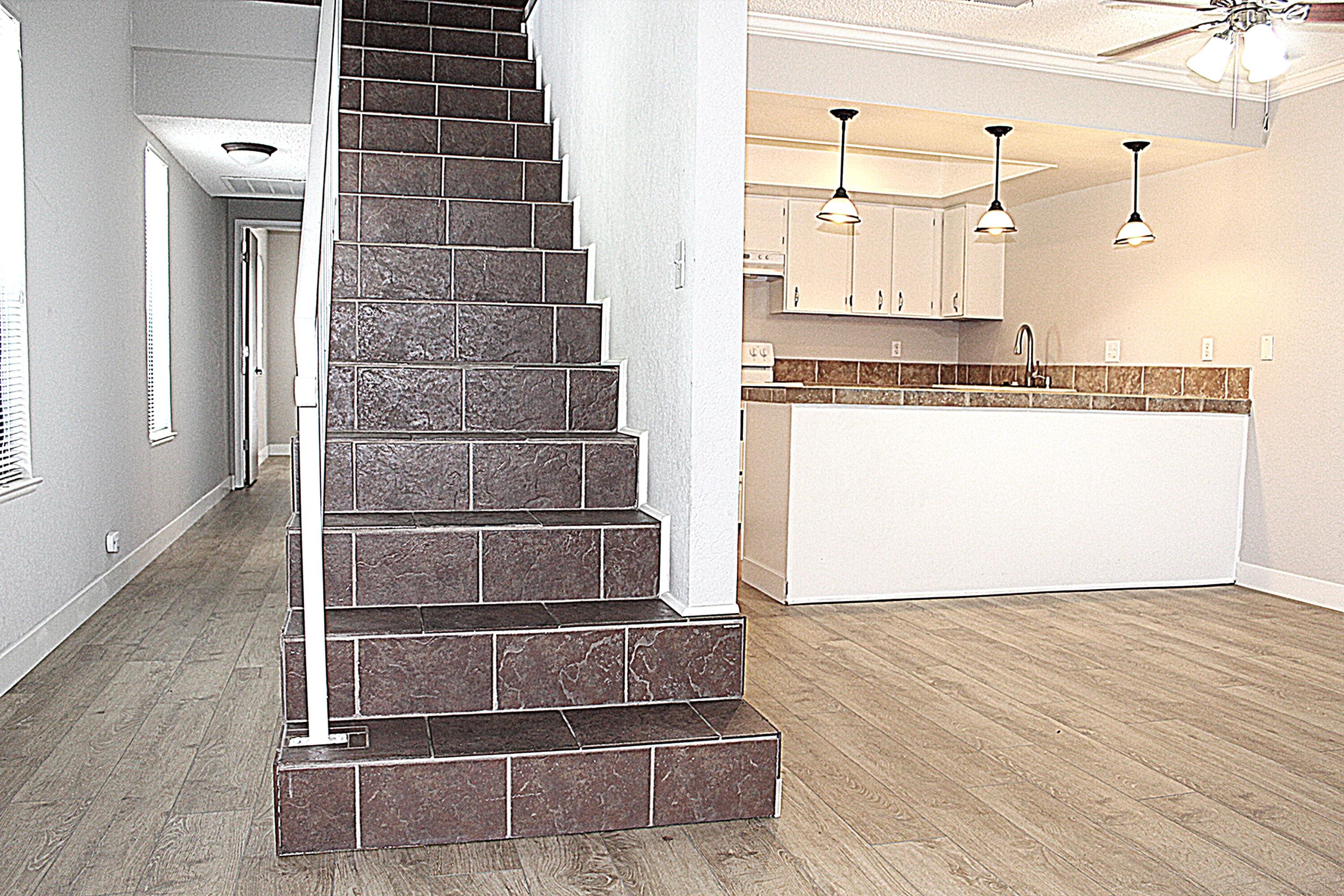 1975 Bechelli Lane Redding, CA 96002 - Photo 14 of 25 Stairs and kitchen