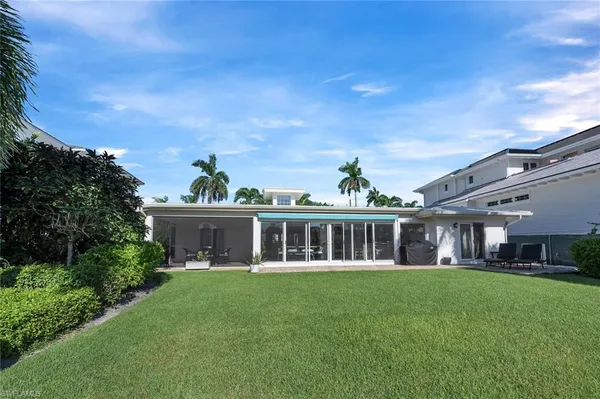 a view of a house with a big yard