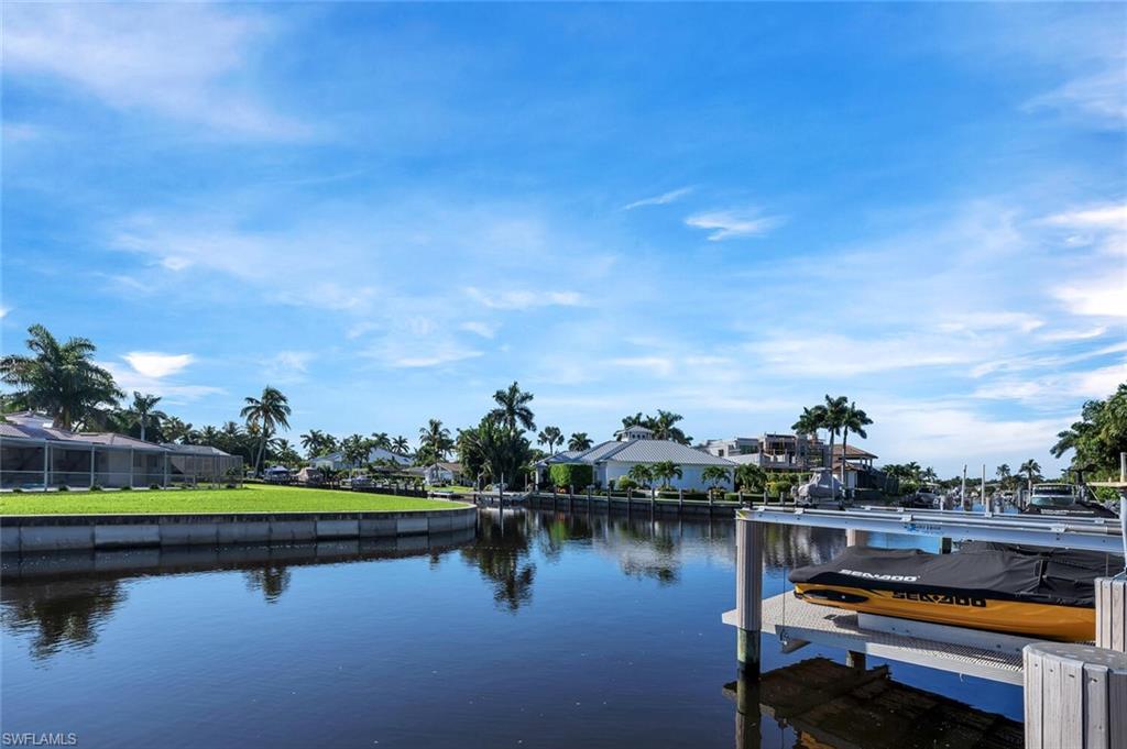 1925 Tarpon Road Naples, FL 34102 - Photo 41 of 41 a view of swimming pool with outdoor seating and yard
