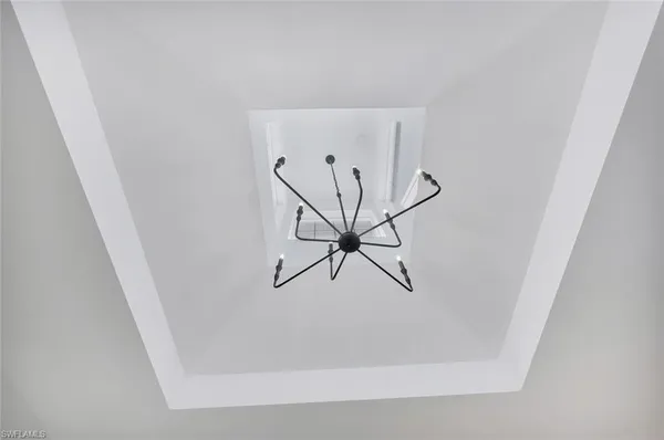 a view of a hallway with a door