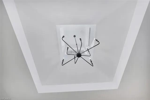 a view of a hallway with a door