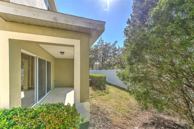 a yellow house with outdoor space