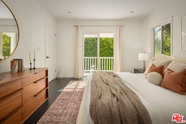 a view of a patio with a table and chairs