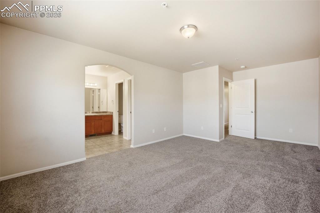 3019 Shikra View Colorado Springs, CO 80916 - Photo 14 of 42 an empty room with a bathroom