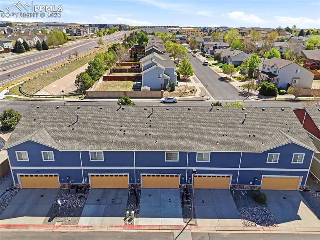3019 Shikra View Colorado Springs, CO 80916 - Photo 39 of 42 an aerial view of residential houses with outdoor space