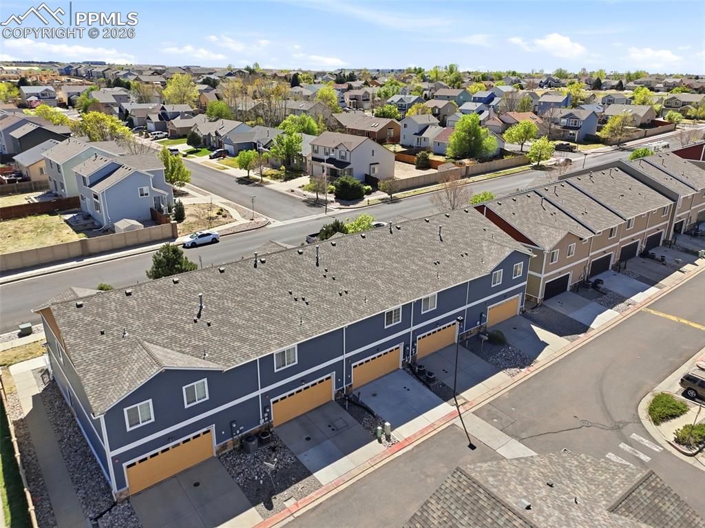 3019 Shikra View Colorado Springs, CO 80916 - Photo 41 of 42 a view of a balcony with an outdoor seating