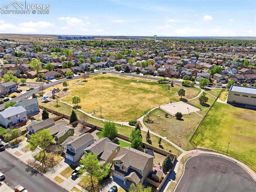 3019 Shikra View Colorado Springs, CO 80916 - Photo 42 of 42 an aerial view of residential houses with outdoor space