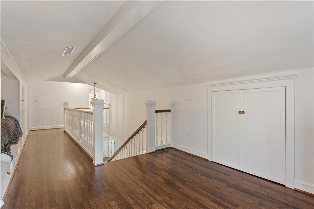 410 Rice Avenue Waco, TX 76708 - Photo 30 of 40 a view of a hallway with wooden floor