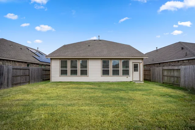 a house view with a garden space