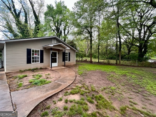 1313-d F D F Fuller Drive Griffin, GA 30224 - Photo 2 of 4 front view of a house with a yard