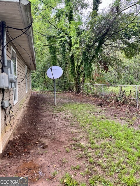 1313-d F D F Fuller Drive Griffin, GA 30224 - Photo 4 of 4 a backyard of a house with table and chairs