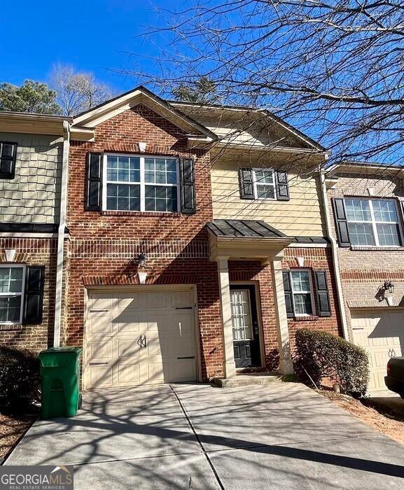 879 Langston Trace Stone Mountain, GA 30083 - Photo 1 of 16 a front view of a house