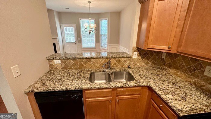 879 Langston Trace Stone Mountain, GA 30083 - Photo 9 of 16 a bathroom with a granite countertop sink and a mirror
