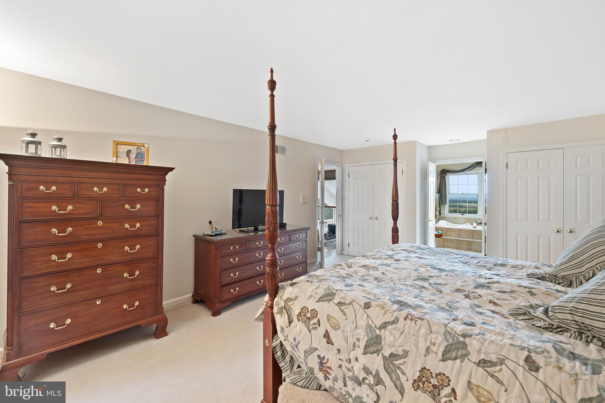 4419 Teen Barnes Road Jefferson, MD 21755 - Photo 54 of 70 a bedroom with a bed and a dresser