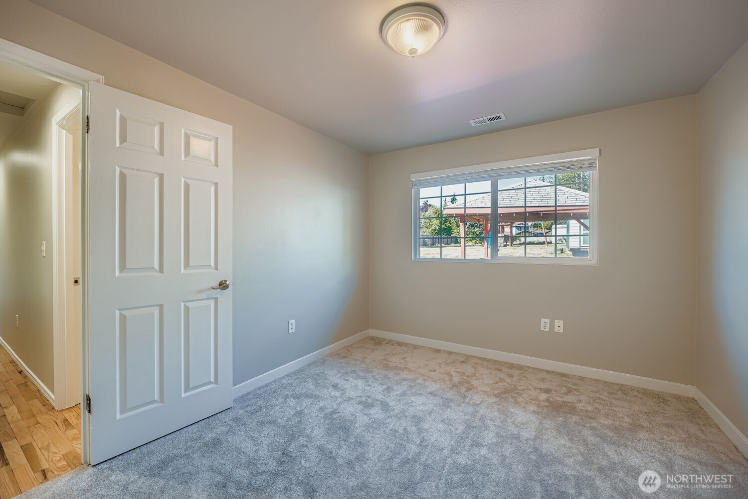 22408 Meridian Avenue South Bothell, WA 98021 - Photo 12 of 28 an empty room with windows