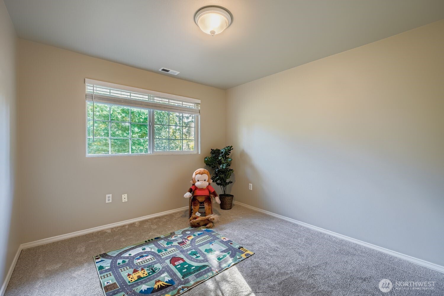 22408 Meridian Avenue South Bothell, WA 98021 - Photo 17 of 28 a room with furniture and a window