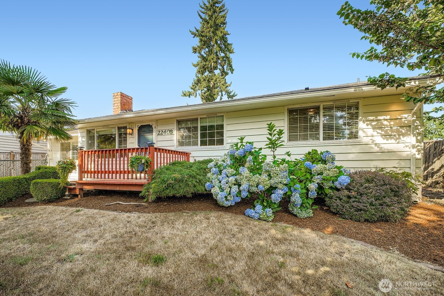 22408 Meridian Avenue South Bothell, WA 98021 - Photo 2 of 28 a view of a house with a small yard and potted plants