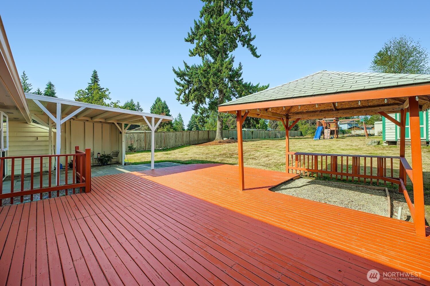 22408 Meridian Avenue South Bothell, WA 98021 - Photo 24 of 28 a balcony with table and chairs