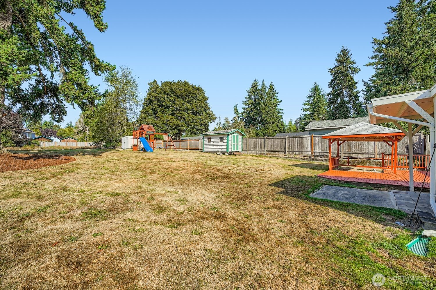 22408 Meridian Avenue South Bothell, WA 98021 - Photo 26 of 28 a view of a house with backyard and sitting area