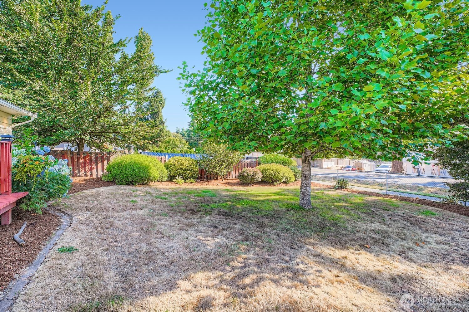 22408 Meridian Avenue South Bothell, WA 98021 - Photo 28 of 28 a backyard of a house with lots of green space