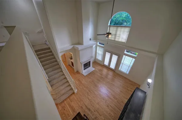 a view of an entryway with wooden floor