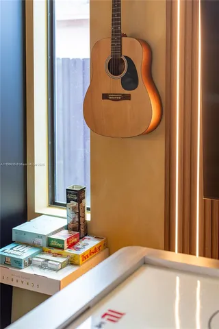 a view of a patio with table and chairs