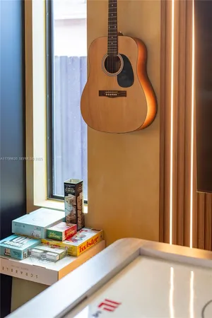 a dining room with chairs and painted walls
