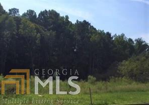 Gentle Tree Lined Private Lot in Gated Manor North to Build Your New Custom Dream Home! Bring Your Own Plans or Design Plans with Hampton Custom Homes for Your Hand Crafted Custom Home with a Prestigious Milton Address and Low Cherokee Taxes!