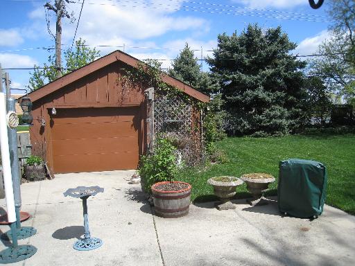 141 Queenswood Road Bolingbrook, IL 60440 - Photo 3 of 5 a view of outdoor space yard and patio