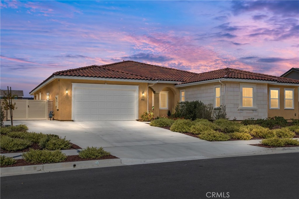 17041 Miracle Lane Riverside, CA 92503 - Photo 1 of 1 a front view of a house with a yard and garage