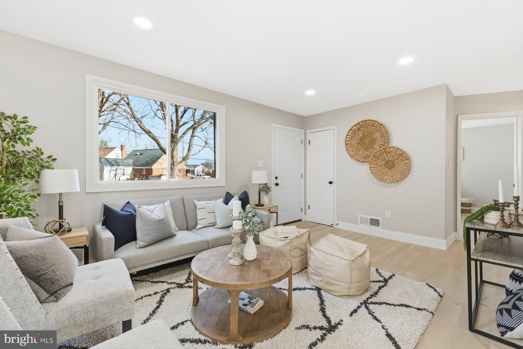 3802 Elby Court Silver Spring, MD 20906 - Photo 4 of 33 a living room with furniture and a large window