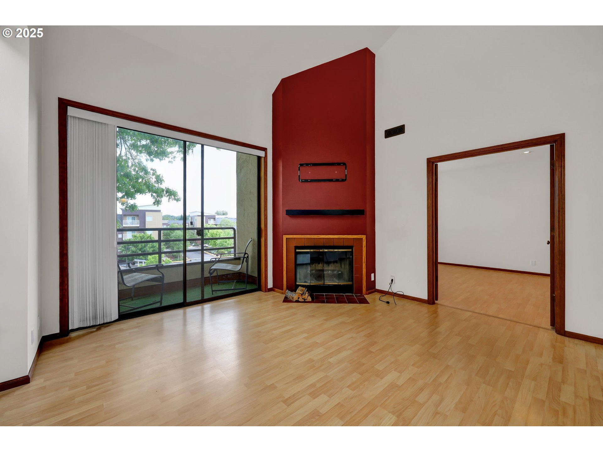 648 Wimbledon Court Eugene, OR 97401 - Photo 16 of 45 a view of empty room with floor to ceiling window and an empty room